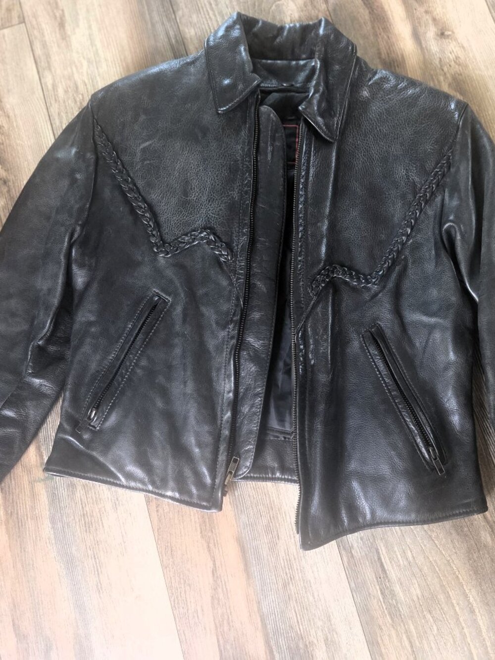 Women’s black leather motorcycle jacket with Braided Detail